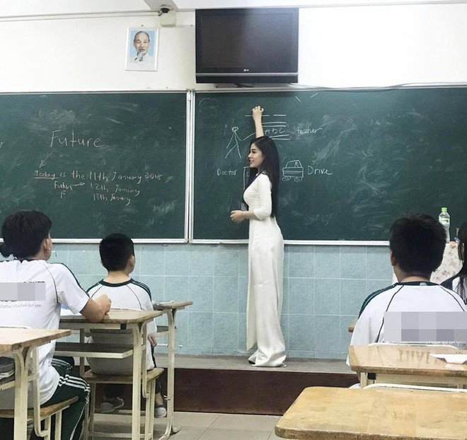 Cô giáo sexy nhất MXH Việt Nam: Bị phê bình vì ăn mặc nóng bỏng nhưng quyết không thay đổi - Ảnh 1.